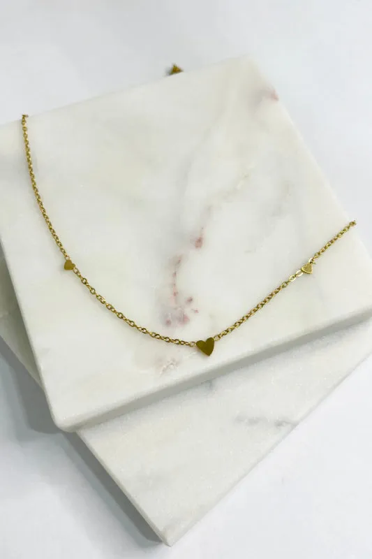 alice triple heart necklace