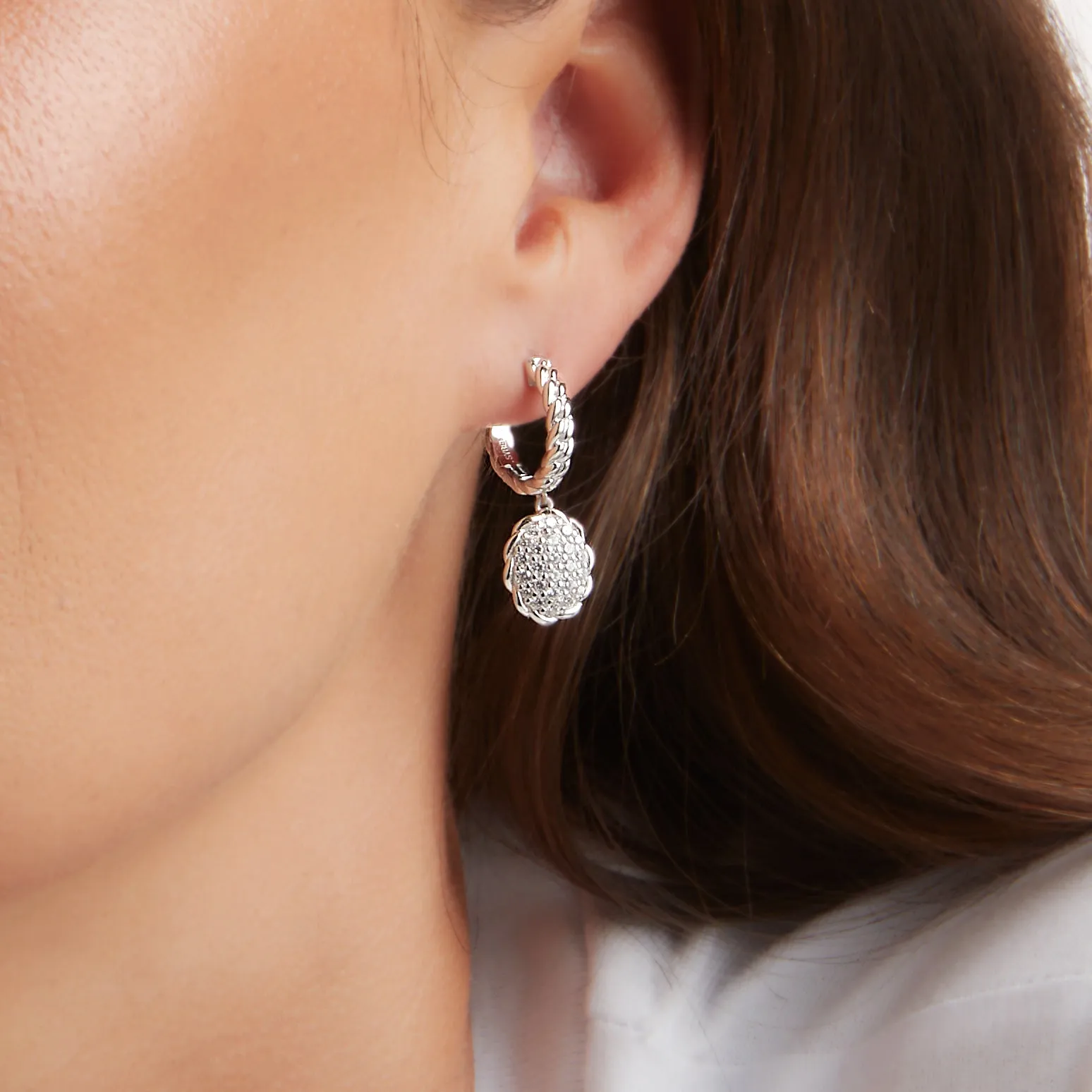 Asta Rhodium Plate Oval CZ plaited hoop earrings