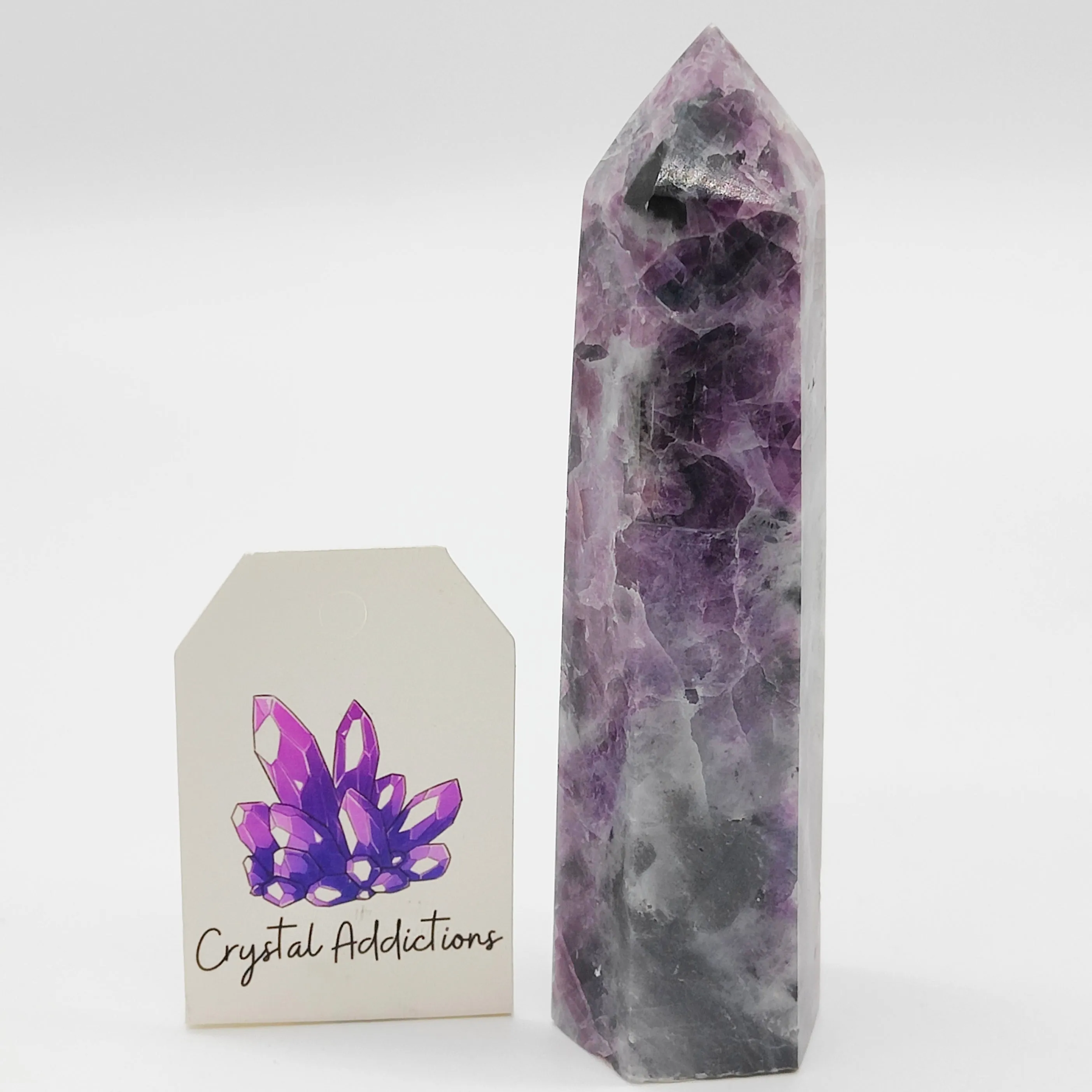 Fossilised Fluorite Point # 13